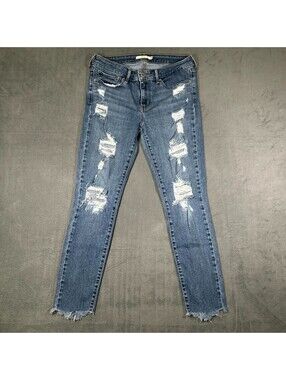 Levi's 711 Jeans Womens 28x28 Medium Wash Denim Skinny Distressed Raw Hem Ripped